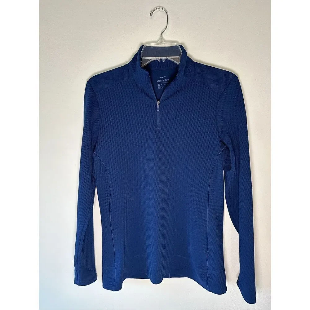 Nike women’s long sleeve 1/4 zip blue athletic top size XS. #27-1497
